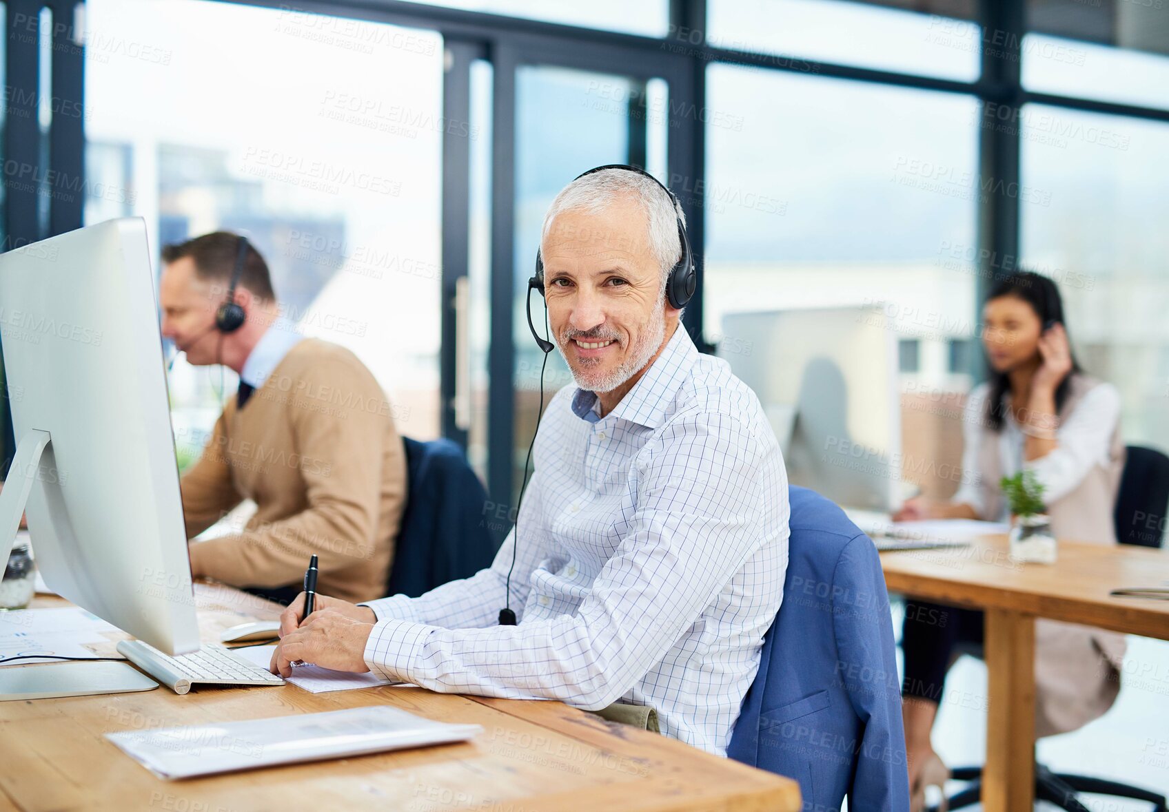 Buy stock photo Mature man, portrait and call centre advisor in coworking office, crm and consultant for support. Male person, headset and telemarketer for sale service, writing notes and information for assistance