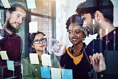 Buy stock photo Teamwork, brainstorming and business people with glass board, writing ideas or sticky notes in office. Collaboration, diversity and group of employees in meeting for planning, strategy and synergy