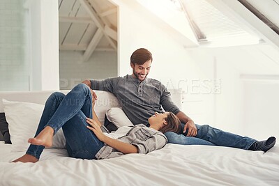Buy stock photo Relax, couple smile and holding hands in bed in the morning with love, bonding and care together in a home. Chat, marriage and romance of happy people in a bedroom with support and commitment