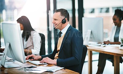 Buy stock photo Mature man, call centre and headphones in office as consultant for customer service or help. Happy, male person and telemarketing for communication with client for sales or support at company
