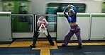 Asian woman, dancing and railway station by train for energy, art or underground performance in subway. Female person, friends or hip hop dancers in Japan, practice or training together by transport