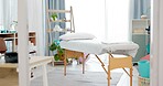 Therapy room, empty and a bed for physiotherapy, hospital exam or healthcare test. Clinic bedroom, medicine and gear and tools in an chiropractic or orthopedic office for a consultation or check