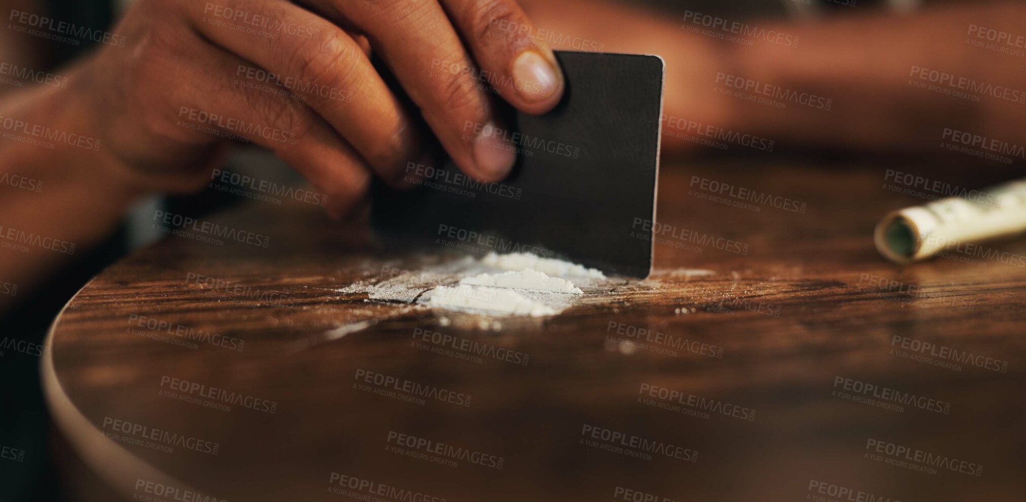 Buy stock photo Person, house and hand with cocaine, credit card and illegal substance with addiction. Overdose, habit and evening with closeup, habit or low energy with crime, drugs and health risk in living room