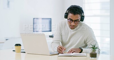 Buy stock photo Writing, laptop and headphones with business man in office for learning, webinar and demo walkthrough. Policy training, online orientation or streaming with person in agency for professional upskill