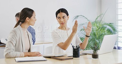 Buy stock photo Laptop, business women and team planning in meeting to review brand proposal with graphic designer. Computer, creative and discussion in office for logo size, explain project and objective briefing