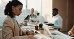 Documents, finance and report with business woman in coworking office for accounting admin. Financial, paper and reading with employee at desk in workplace for portfolio, risk or wealth management