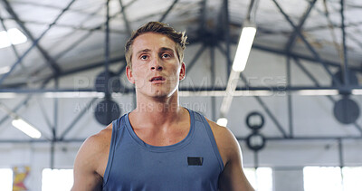 Buy stock photo Serious, fitness and man in gym for workout, bodybuilding or training on weekend with wellness. Active, power and male athlete in sports center with strength challenge, cardio or exercise for health.