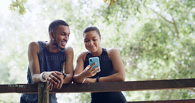 Buy stock photo Hiking, nature and couple with cellphone on bridge, outdoor exercise or digital map for trail navigation. Fitness, step counter and people with mobile location app, fauna or flora research from below