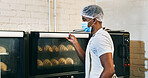 Croissant, baker and oven with man in kitchen for cooking, culinary process and food production. Health, wheat and baking with person in coffee shop for catering, restaurant and small business owner