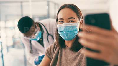 Buy stock photo Smile, woman and selfie with doctor for injection, vaccine photography and awareness on social media. People, face mask and profile picture of pandemic treatment, medical procedure and healthcare ppe