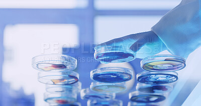 Buy stock photo Medical, hand or person in lab with petri dish, biotechnology or liquid test for vaccine development. Science, below or expert in clinic with samples, research or analysis in pharmaceutical study.