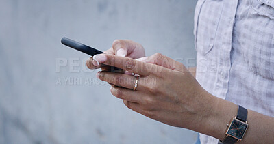 Buy stock photo Typing, hands and woman outdoor with phone, post comment and chat update on social media. Message, content browse and girl at wall with mobile, internet scroll and messaging reply on digital app.