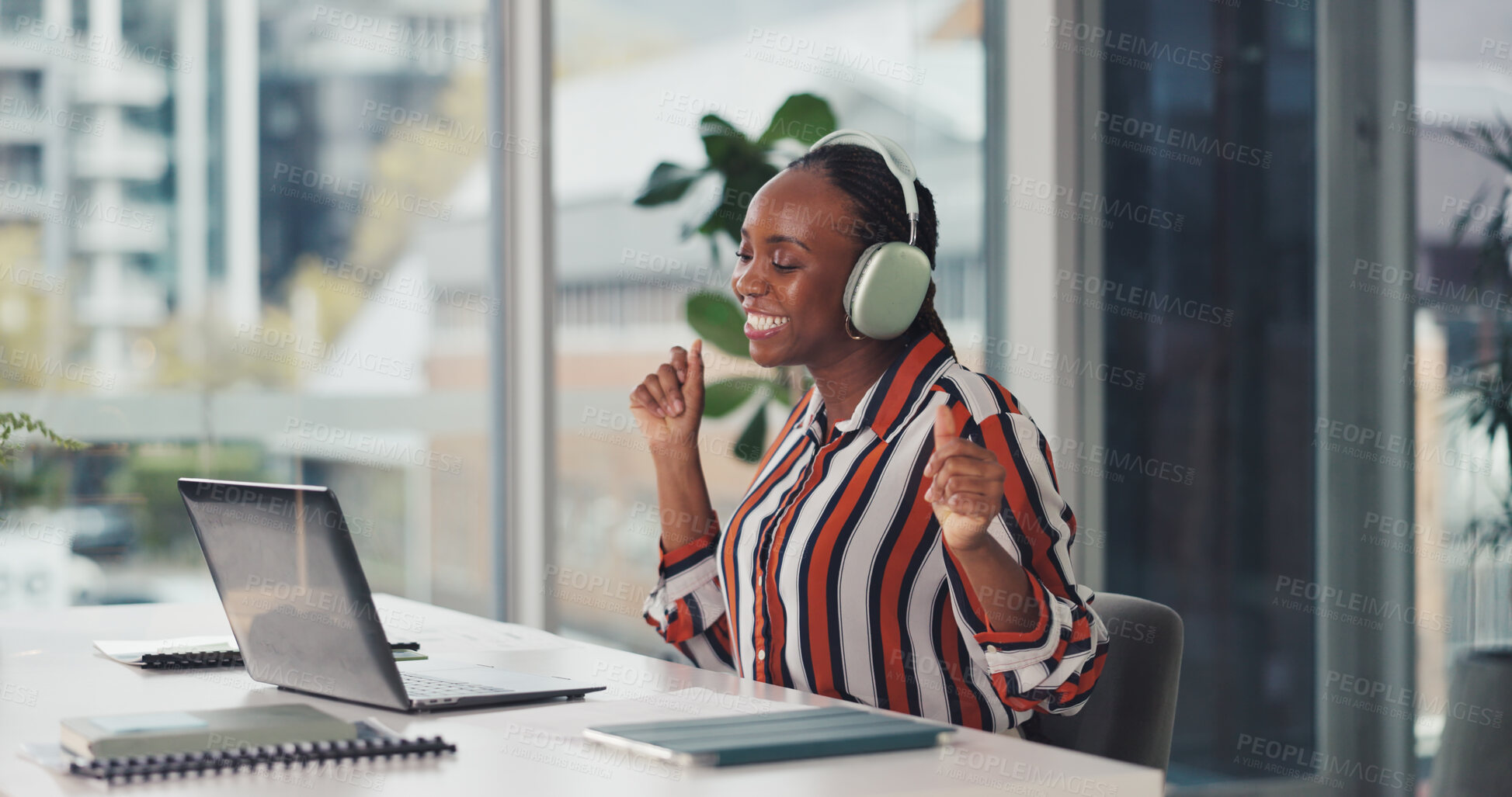Buy stock photo Black woman, dance and headphones with laptop in office for streaming, podcast and good news. Smile, person and movement rhythm with pc, editor feedback and listening to music for work entertainment