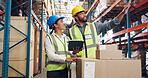 Supply chain, pointing and people in warehouse on tablet for distribution, inventory or order inspection. Meeting, storage depot and man with woman on digital tech for logistics, shipping or delivery
