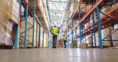 Buy stock photo Man, back and inspection at warehouse, logistics and shelf with low angle, storage or walk for safety check. Person, supply chain and cargo for inventory management, export or job at shipping company