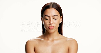 Buy stock photo Beauty, calm and skincare with woman on studio space for cosmetics, dermatology or zen. Aesthetic, eyes closed and wellness with model isolated on white background for natural cosmetology results