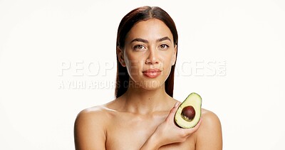 Buy stock photo Woman, avocado and beauty in studio portrait with mockup space, skincare or benefits on white background. Person, model and organic fruit for antioxidants, oil or natural cosmetics for glow in Mexico