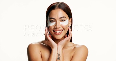 Buy stock photo Portrait, happy woman or eye patch in studio for skincare, dermatology and brightening dark circles. Space, person and collagen mask for wellness, healthy skin or beauty cosmetic on white background.
