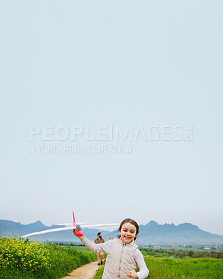 Buy stock photo Smile, child and play with airplane outdoor for fun activity, flying games and bonding together. Mockup space, family and happy girl running with toy, weekend break and kid development in countryside