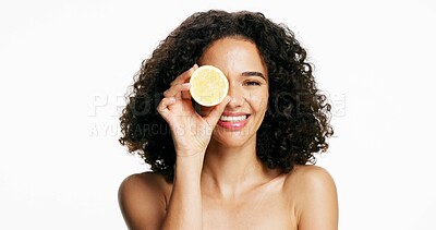 Buy stock photo Happy woman, portrait and lemon with skincare in studio for vitamin C on a white background. Female person, model or smile with natural organic fruit for health, wellness or collagen on mockup space