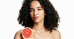 Skincare, grapefruit and portrait of woman in studio with beauty, natural or cosmetics routine. Vitamin c, hydration and female person with citrus fruit for facial brightening by white background.