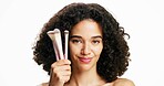Makeup, brushes and portrait of woman in studio for beauty, cosmetics and self care routine. Smile, face tools and female person from Brazil with facial cosmetology treatment by white background.