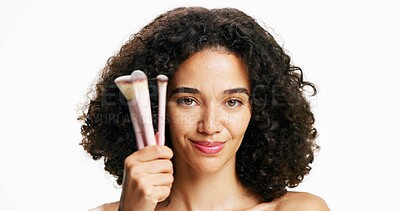 Buy stock photo Makeup, brushes and portrait of woman in studio for beauty, cosmetics and self care routine. Smile, face tools and female person from Brazil with facial cosmetology treatment by white background.