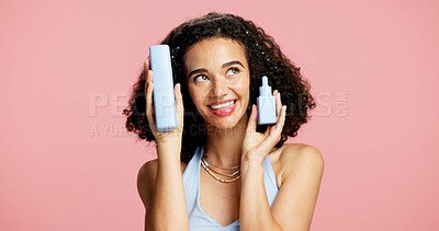 Buy stock photo Skincare, happy woman and beauty product in studio, serum treatment or thinking of wellness shine. Healthy glow, clear skin or person with cleanser for dermatology, mockup space or pink background