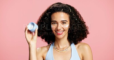 Buy stock photo Beauty, container and portrait of woman in studio for dermatology cream or lotion recommendation. Moisturizer, skincare and smile of model isolated on pink background for cosmetic product marketing