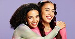 Hug, beauty and portrait of friends in studio for support, skincare and aesthetic glow. Bonding, gen z connection and cosmetology with women on purple background for self care, shine and glow