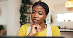 Laptop, reading and remote work with black woman at desk in home for startup planning or research. Computer, small business and thinking with African freelancer in apartment for report or review