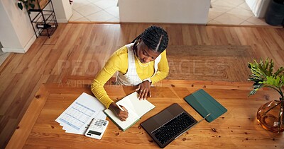 Buy stock photo Above, woman or writing in home with laptop, calculator or documents for household finance admin. Black person, tech or notes at table with diary for monthly bills, budget plan or financial priority.