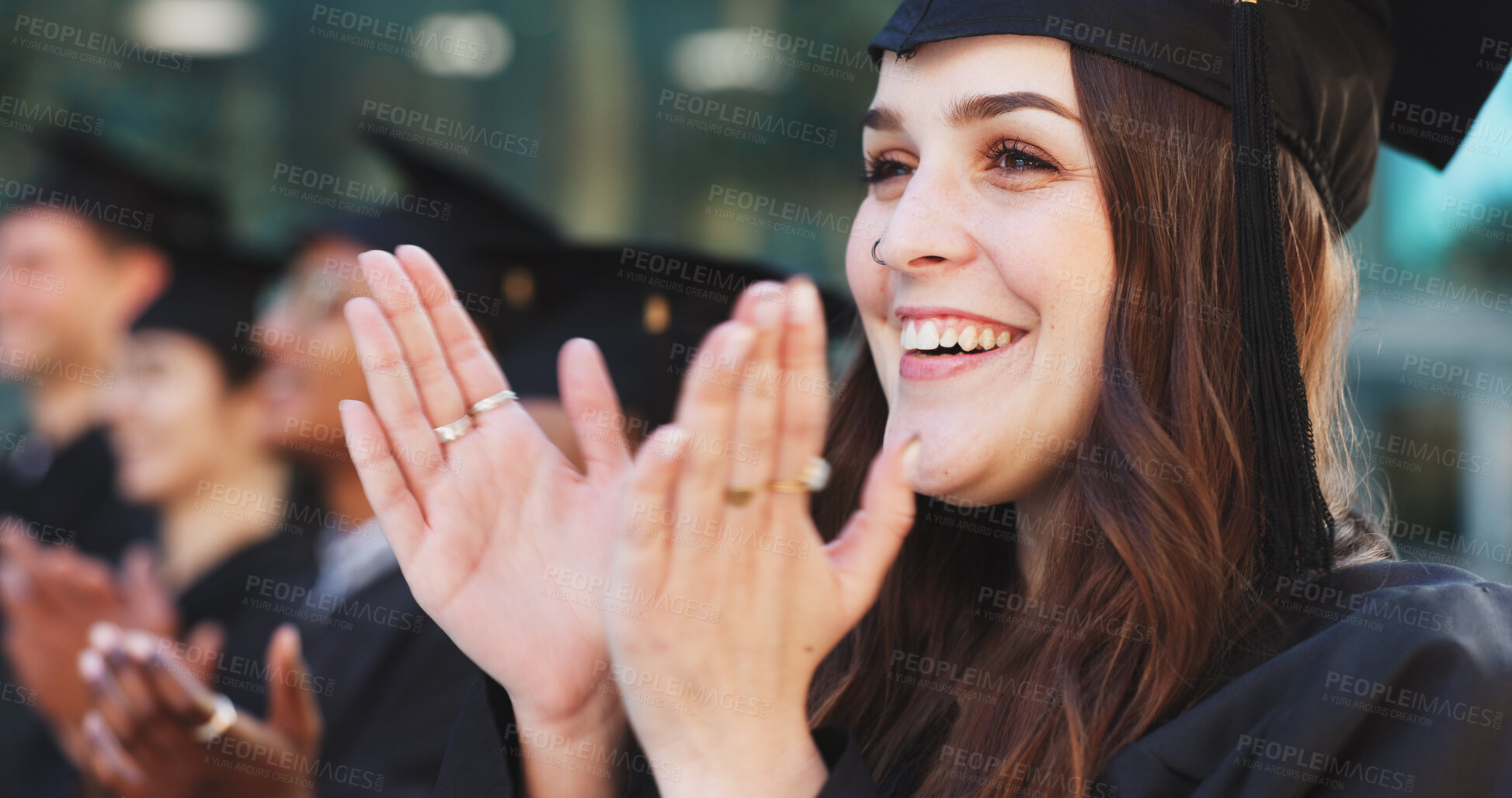 Buy stock photo Applause, graduation and celebration with woman in college for students, diploma success and ceremony. Achievement, university degree and academy pride with people on campus for scholarship event