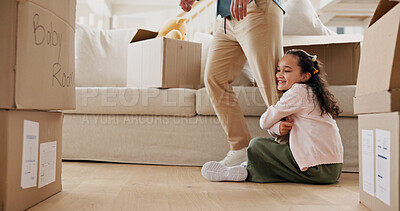 Buy stock photo Play, lounge and kid hanging to leg, separation anxiety or dependance for adjustment comfort. Clingy behavior, connection or man with girl in new home for support,  attachment or safety in attention
