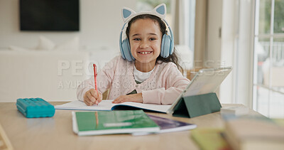 Buy stock photo Home, portrait and child with headphones, online education and listening to audio lesson or writing. Happy, student and girl with tech for homework, elearning and development with notebook in USA