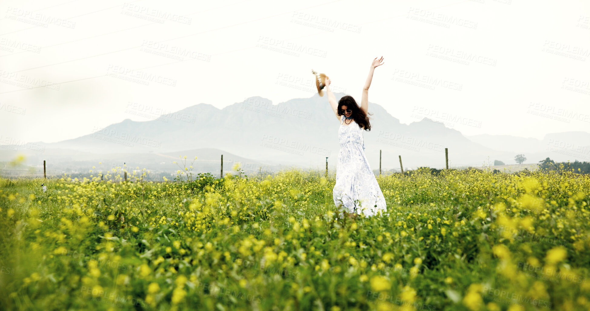 Buy stock photo Dancing, woman and freedom in field, fun and adventure in nature, traveler and fresh air on holiday. Outdoor, space and person on summer vacation, excited and break in countryside or celebration