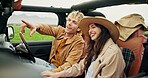 Travel, happy couple and pointing in car for road trip, holiday adventure and sightseeing together. Love, people and weekend getaway in vehicle for countryside tourism, vacation journey and exploring