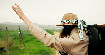 Buy stock photo Back, woman and window of car for road trip with fresh air, travel and adventure freedom. Female person, vehicle and breeze with sensory experience, fun journey and explore nature for safari holiday