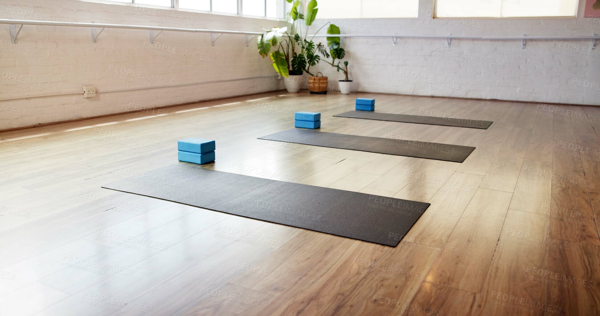 Buy stock photo Yoga, block and equipment with mat in studio for fitness, empty room and wellness class. Pilates session, exercise space and interior of health club for training setup, holistic gear and gym center