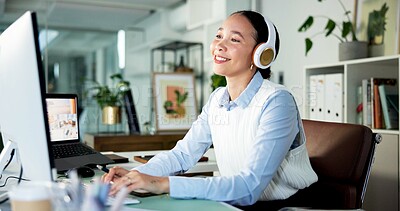 Buy stock photo Happy woman, typing or listening with headphones for music, audio streaming or podcast in office. Female person, administrator or vibe with smile for sound playlist, tune or software app in workplace