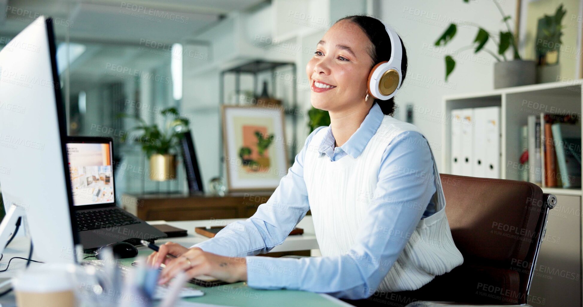 Buy stock photo Happy woman, typing or listening with headphones for music, audio streaming or podcast in office. Female person, administrator or vibe with smile for sound playlist, tune or software app in workplace