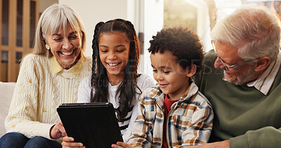 Buy stock photo Tablet, relax and grandparents with siblings on sofa in home for watching movie, series or show. Happy, digital technology and senior people with kids for streaming film together in living room.