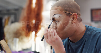 Buy stock photo Drag artist, cosmetics and mirror in dressing room for stage preparation, identity or glamour. Person, makeup transformation or backstage for beauty, self expression and creative alter ego with brush