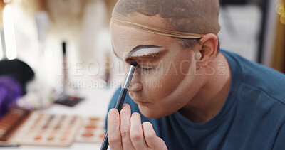 Buy stock photo Drag artist, makeup or brush in dressing room for stage preparation, identity or pride. Person, cosmetic transformation or backstage for beauty, self expression and creative alter ego with eye shadow