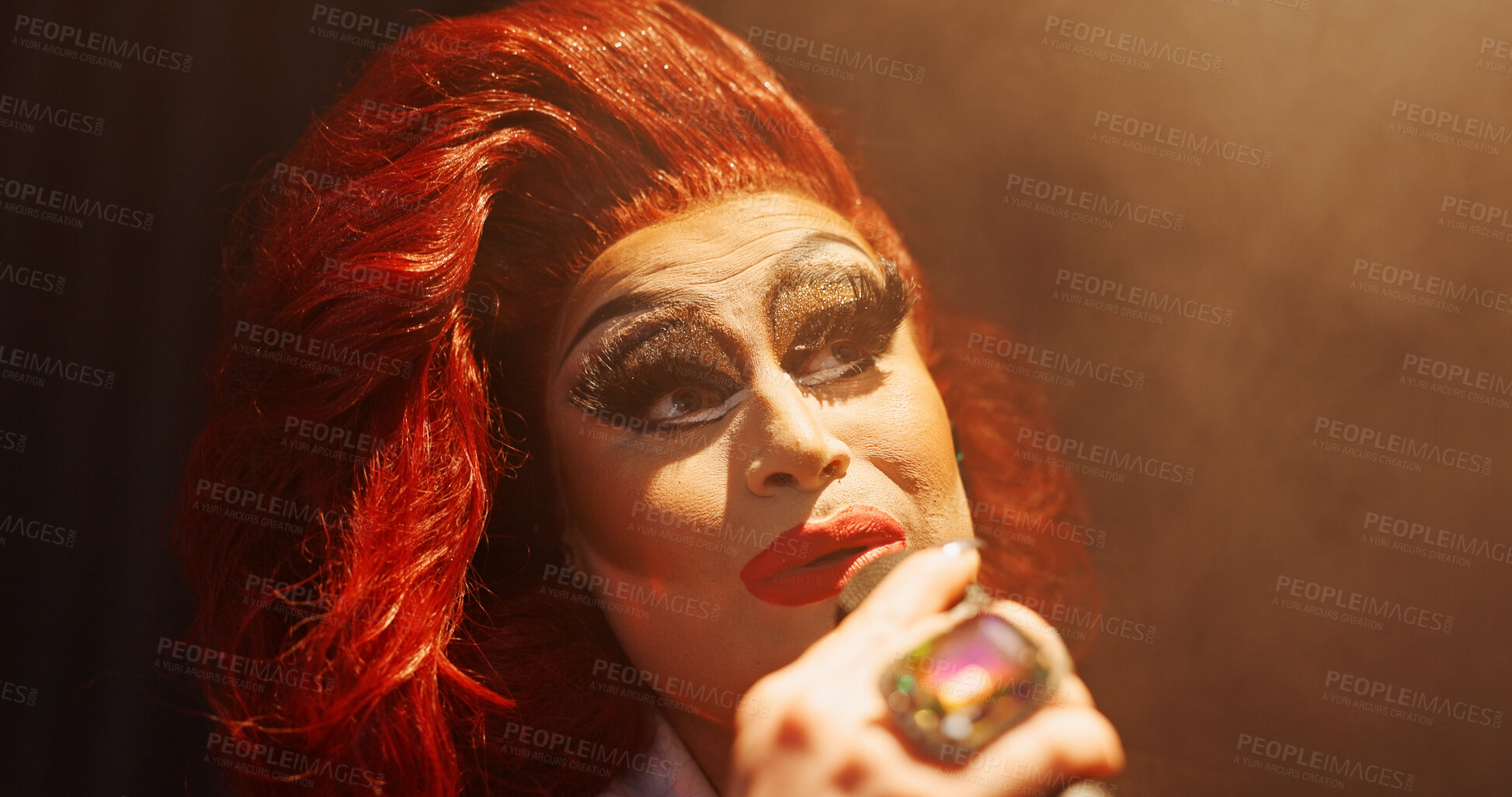 Buy stock photo Person, drag performer and sing with mic for performance, hosting show and lip sync event. Artist, spotlight and acting for live entertainment, theater club and unique character for nightlife talent