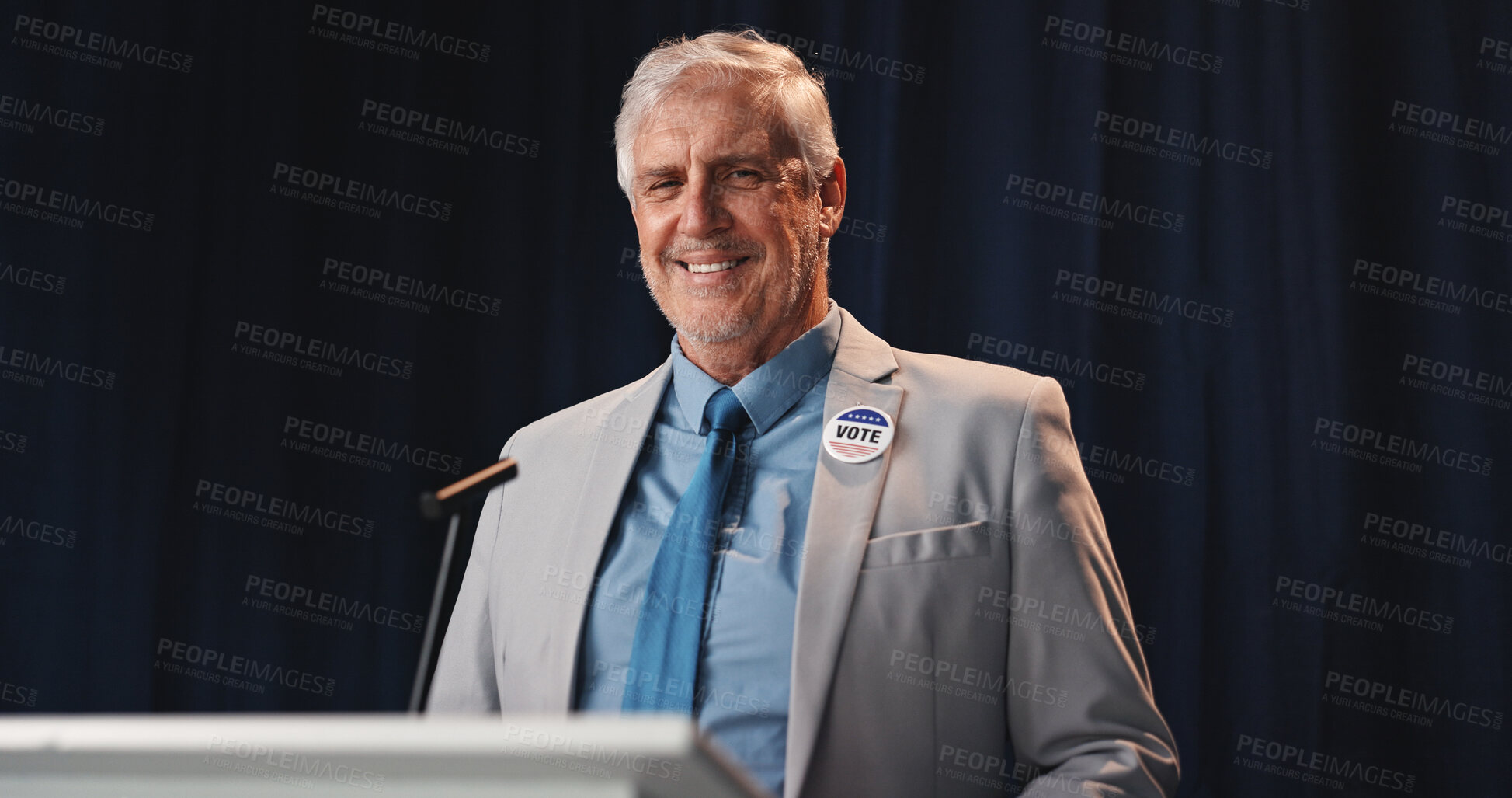 Buy stock photo Portrait, politician and man with speech, press conference and smile with announcement. Happy, mature person or speaker with official event, vote or legislator with policy update, activism or seminar