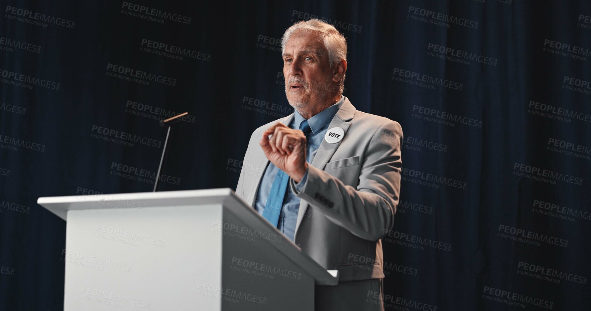 Buy stock photo Talking, politician and man with speech, press conference and activism with announcement. Happy, mature person or speaker with official event, vote or legislator with policy update, podium or seminar