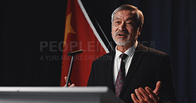 Buy stock photo Mic, Asian man and politician and podium for election, democracy or political campaign. Speech, country flag and mature speaker at conference, meeting or seminar for vote or activism at convention
