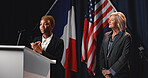 Election, politicians and women on podium for speech with mic for democratic selection at debate. Campaign, discussion and candidates with press conference for votes on stage for public relations.
