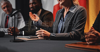 Buy stock photo Politics, hands and woman with speech at press conference for campaign update, delegation or feedback. Global forum, government panel or speaker with discussion for policy decision or media relations